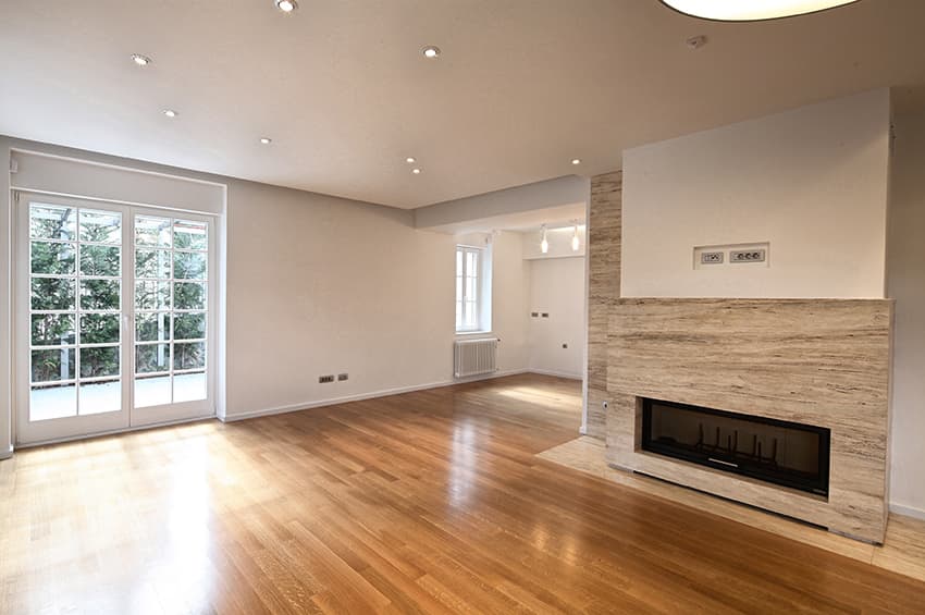 unfurnished living room with fireplace